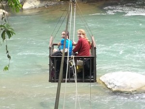 Troop #31822 of Northern California cross a river in an "andarivel"