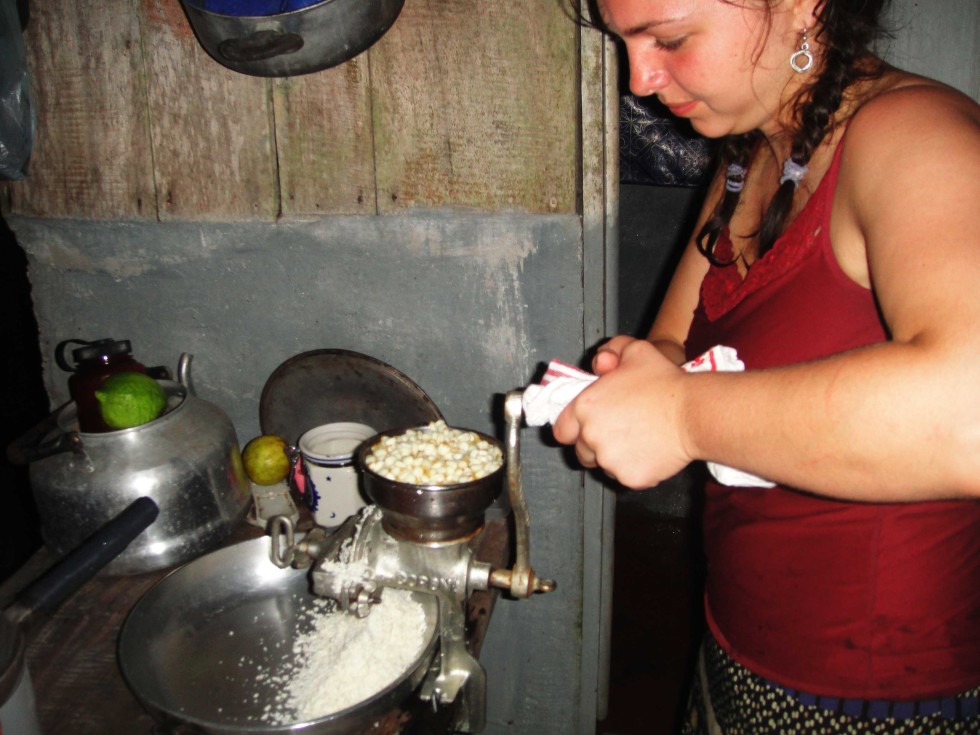 Grinding corn to make tortillas, the tico way!