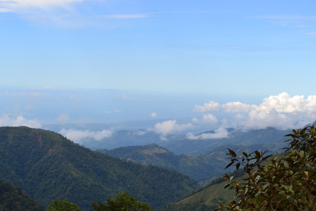 A view of the Costa Rican Mountains with small cloud coverage