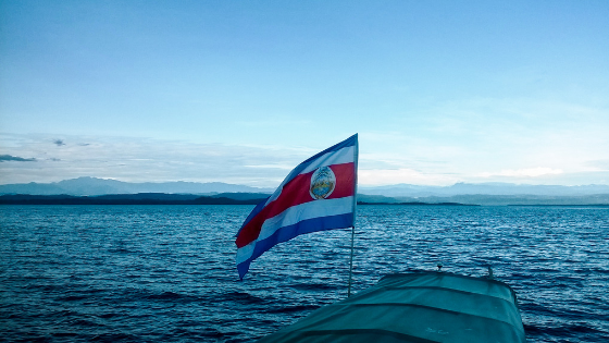 Costa Rica flag on a boat in the ocean